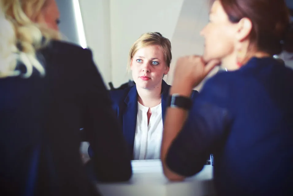 Two recruiters interview a candidate